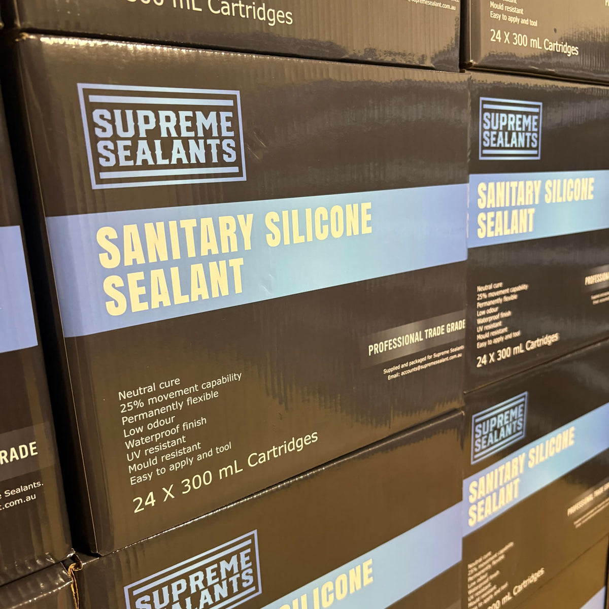 Stacked Supreme Sealants cartons ready for bulk and trade orders